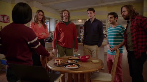 Jian-Yang, back to camera, presenting SeeFood.